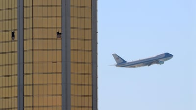 Air Force One departs Las Vegas past the broken windows on the Mandalay Bay hotel, where shooter Stephen Paddock conducted his mass shooting along the Las Vegas Strip in Las Vegas, Nevada. Mike Blake / Reuters