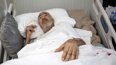 Bedridden diabetic Hussein Ramadan is 78. His treatment has cost Dh84,000. Victor Besa for The National