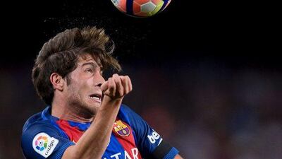 Barcelona’s midfielder Sergi Roberto heads the ball during the match against Atletico Madrid. Josep Lago / AFP