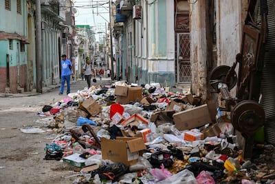 Rubbish is piled up on a street in Havana. AFP