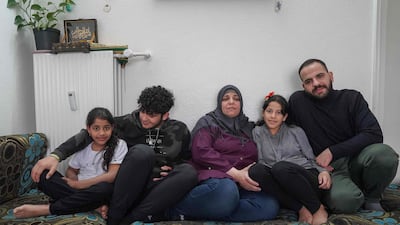 Sabrina Al Fayyad, centre, and her family had their Danish residency papers revoked. AFP