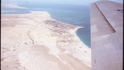 Floodwater often inundated Abu Dhabi island during the 1960s as defences had yet to be built. Photo: David Riley