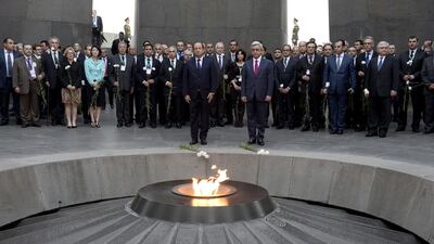 French President Francois Hollande and Armenian President Serzh Sarkisian pay tribute at the genocide memorial, which commemorates the 1915 mass killing of Armenians in the Ottoman Empire, in Yerevan. Stephane De Sakutin / AFP Photo