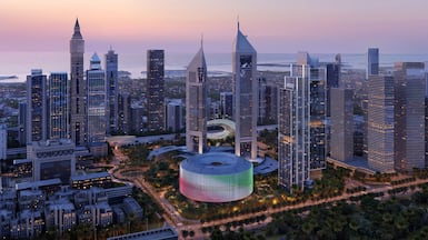 A rendering of Dubai Holding’s new headquarters, centre, and Jumeirah Residences Emirates Towers, right. Photo: Dubai Holding