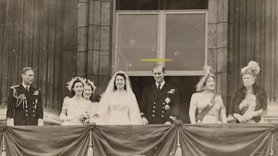 From left: King George VI, Princess Margaret, Lady Mary Cambridge, Princess Elizabeth, Philip Mountbatten, Queen Elizabeth and Queen Mary on the balcony at Buckingham Palace after the wedding of Princess Elizabeth and Philip Mountbatten in London, England, on November 20, 1947. Getty Images