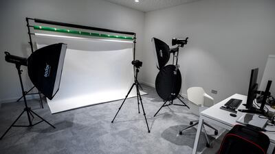 A mini photo studio is located near the reception area that members can use.