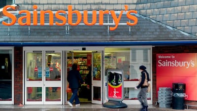 Sainsbury's intends to buy Walmart's Asda. The UK competition commission will have to agree the deal first. Sang Tan / AP Photo