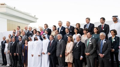 Sheikh Mohamed bin Zayed (front row 9th R) stands for a photograph with members of Comite Colbert, during a Sea Palace barza. Seen with Saif Ghobash, director general of Abu Dhabi Tourism and Culture Authority (front row 7th R) and Mohamed Khalifa Al Mubarak, chairman of the Department of Culture and Tourism and Abu Dhabi Executive Council member (front row 8th R). Mohamed Al Hammadi / Ministry of Presidential Affairs