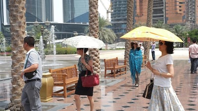 Tourists from the China province of Zhe Jiang visiting Emirates Palace in Abu Dhabi. Visitor numbers from the world's second-biggest economy are set to rocket. Delores Johnson/The National