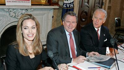 Actress Angelina Jolie, Ambassador Richard Holbrooke, and Sen. Joseph Biden ,D-DE, take their seats before a Congressional briefing on Capitol Hill 28 September, 2005 in Washington, DC. AFP