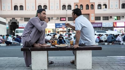 Iftar meals distributed at the New Fatima Mosque adjacent to the Al Ghubaiba Bus Station in Bur Dubai. Antonie Robertson / The National