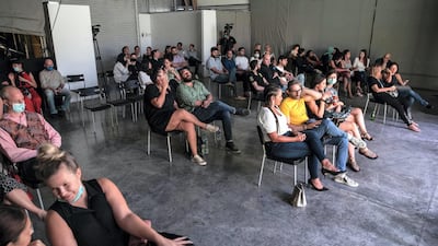 The audience at The Fridge, which reconfigured seating arrangements in checkerboard style with two metres of distance between. Attendees are permitted to remove masks while in their area. Antonie Robertson / The National