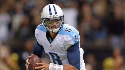Tennessee Titans quarterback Marcus Mariota scrambles during Sunday's win over the New Orleans Saints in the NFL. Eli Baylis / The Hattiesburg American / AP / November 8, 2015