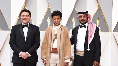Best Foreign Film Director Naji Abu Nowar, left, and cast arrive on the red carpet for the 88th Oscars in Hollywood, California. Valerie Macon / AFP photo