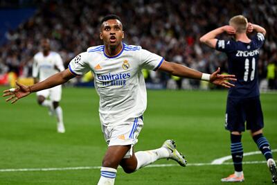 Real Madrid's Rodrygo celebrates his first goal in the Champions League semi-final second leg against Manchester City at the Santiago Bernabeu in Madrid on May 4, 2022. Madrid won the game 3-1 after extra time, clinching a dramatic 6-5 aggregate victory in the tie. AFP