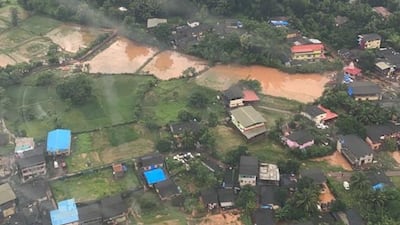 Floodwaters entered low-lying residential areas.