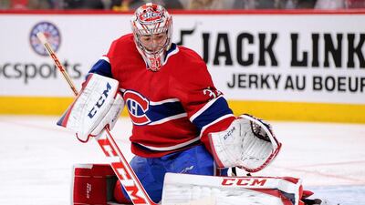 Carey Price of the Montreal Canadiens makes a save during the NHL game against the New York Rangers at the Bell Centre on April 12, 2014, in Montreal, Quebec, Canada. Richard Wolowicz / Getty Images