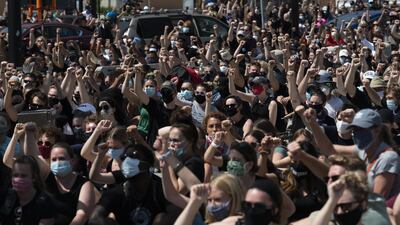 A crowd marching to protest the death of George Floyd gathers outside of US Bank Stadium in Minneapolis. Getty Images