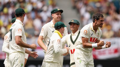 Austrailia fast-bowler Mitchell Starc, right, was man of the match after finishing with figures of 10-133. Getty Images