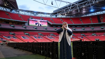 Mohammed Ismaeel Asif led a call to prayer at the Wembley pitchside before guests broke their Ramadan fast. Getty Images