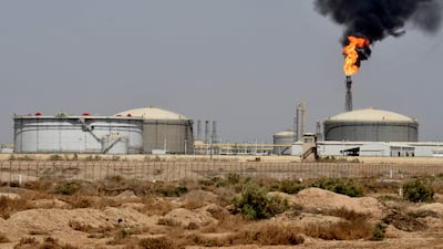 Smoke from a refinery in Iraq's Maysan province. Prime Minister Mohammed Shia Al Sudani has welcomed the entry of Saudi companies into the Iraqi market. AFP
