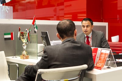 Closing a bank account will usually require a visit to a branch. Mona Al-Marzooqi / The National