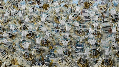 Members of the Paraiso do Tuiuti samba school perform at the Rio Carnival, in Brazil. AFP