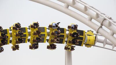 The theme park had a jump in visitor attendance every time it launched a new attraction. Above, the visitors ride the Flying Aces roller coaster. Christopher Pike / The National