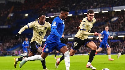 Chelsea's Estevao battles for the ball with Barcelona's Alex Balde. PA