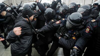 Law enforcement officers clash with protesters during a rally in support of jailed Russian opposition leader Alexei Navalny in Moscow. Reuters