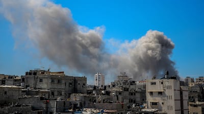 Smoke billows after Israeli bombardment in the vicinity of the Al Shifa Hospital in Gaza city. AFP