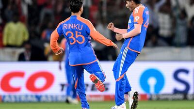 India's Mayank Yadav, right, celebrates after taking the wicket of Bangladesh's Parvez Hossain Emon for a duck. AFP
