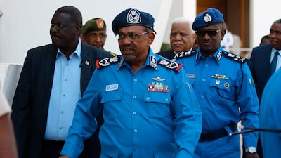 Sudanese President Omar Al Bashir arrives at the police headquarters in Khartoum on December 30, 2018. AFP