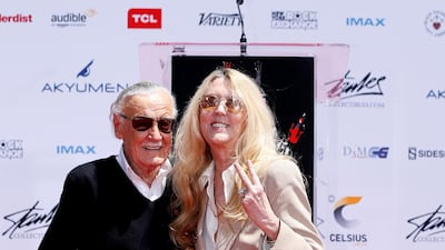 Marvel Comics co-creator Stan Lee poses with his daughter Joan after placing his hand, footprints and signature in cement during a ceremony in the forecourt of the TCL Chinese theatre. Mario Anzuoni / Reuters