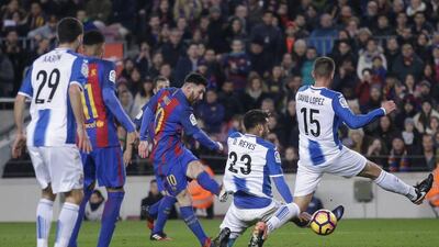 Lionel Messi takes a shot at goal. Manu Fernandez / AP Photo
