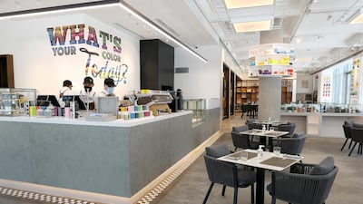 The space blends a customisation store with a coffee shop