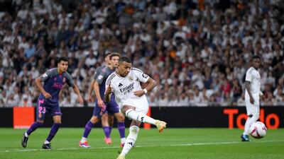Kylian Mbappe scores Real Madrid's fourth goal from the penalty spot in the 90th minute. Getty Images