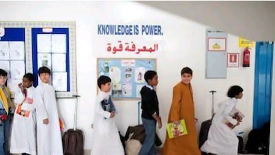 Pupils at Al Ruwais Primary Boys School line up for an Arabic class.