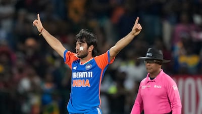 India spinner Ravi Bishnoi picked up three wickets despite a facial injury. AP