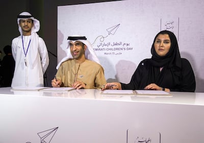Dr Thani Al Zeyoudi, Minister of Climate Change and Environment and Rym Alfalasy, secretary general of the Supreme Council for Motherhood and Childhood, attend the Emirati Children's Day event at Manarat Al Saadiyat. Victor Besa/The National