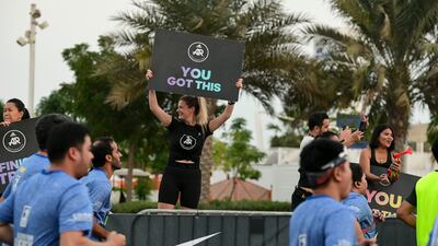 People cheer on participants along the way.