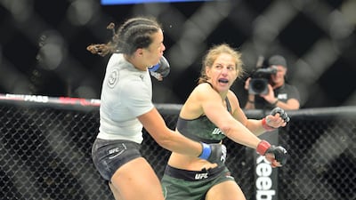 Sarah Moras, right, will contest the first female UFC fight in Abu Dhabi when she competes in UFC 242. USA Today
