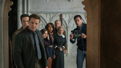 From left: Andrew Scott, Jeremy Renner, Cailee Spaeny, Kerry Washington, Thomas Haden Church, Glenn Close and Daryl McCormack in Wake Up Dead Man: A Knives Out Mystery. Photo: Netflix