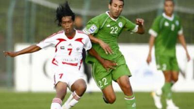 Algeria's Cherif Abdesselem vies with United Arab Emirates' Mohamed Alshehhi during their friendly at the Ferdi-Petit stadium in Le Touquet, France.
