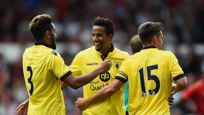 Scott Sinclair of Aston Villa is congratulated for scoring the third goal against Nottingham Forest. Laurence Griffiths / Getty Images
