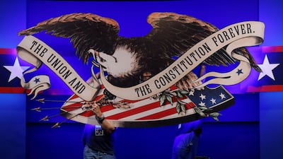 Crews prepare the hall for the first presidential debate between Donald Trump and Joe Biden in Cleveland on Tuesday. Reuters
