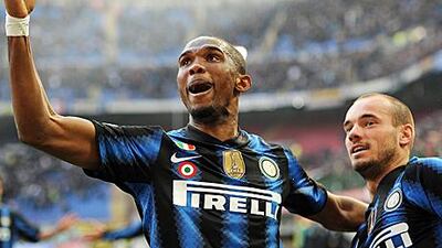 Samuel Eto'o, left, celebrates with Inter teammate Wesley Sneijder after scoring against Genoa.
