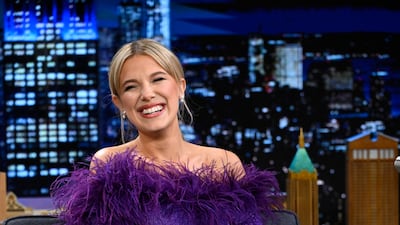 Millie Bobby Brown, wearing purple Raisa Vanessa, while appearing on the 'Tonight Show Starring Jimmy Fallon' on May 13, 2022. Getty Images