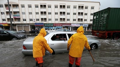 Drainage machines and water tankers had to be used to help clear the excess water after heavy rain in Sharjah on Monday. Christopher Pike / The National