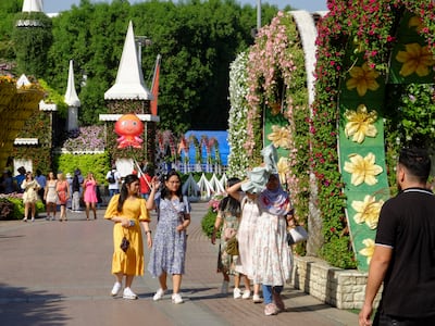 Visitors at Dubai Miracle Garden on October 10. Antonie Robertson / The National